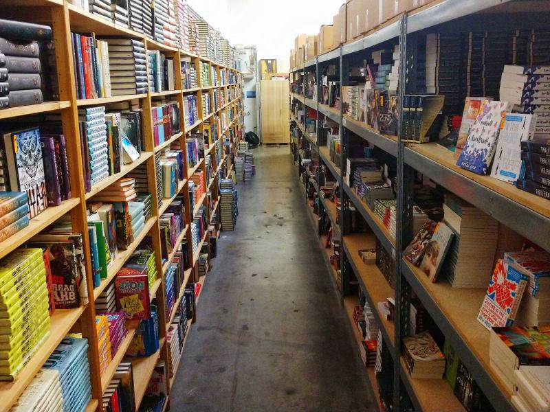 long double sided row of bookshelves